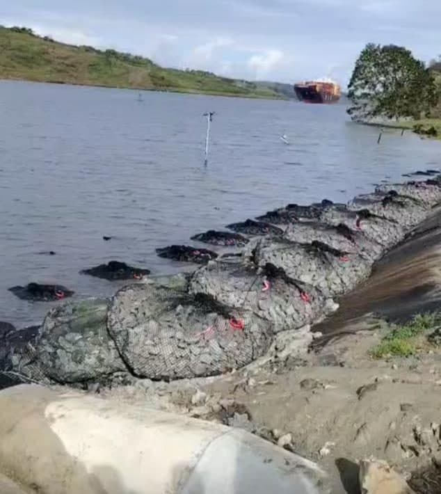 Rock bags stacked along a coastal bank